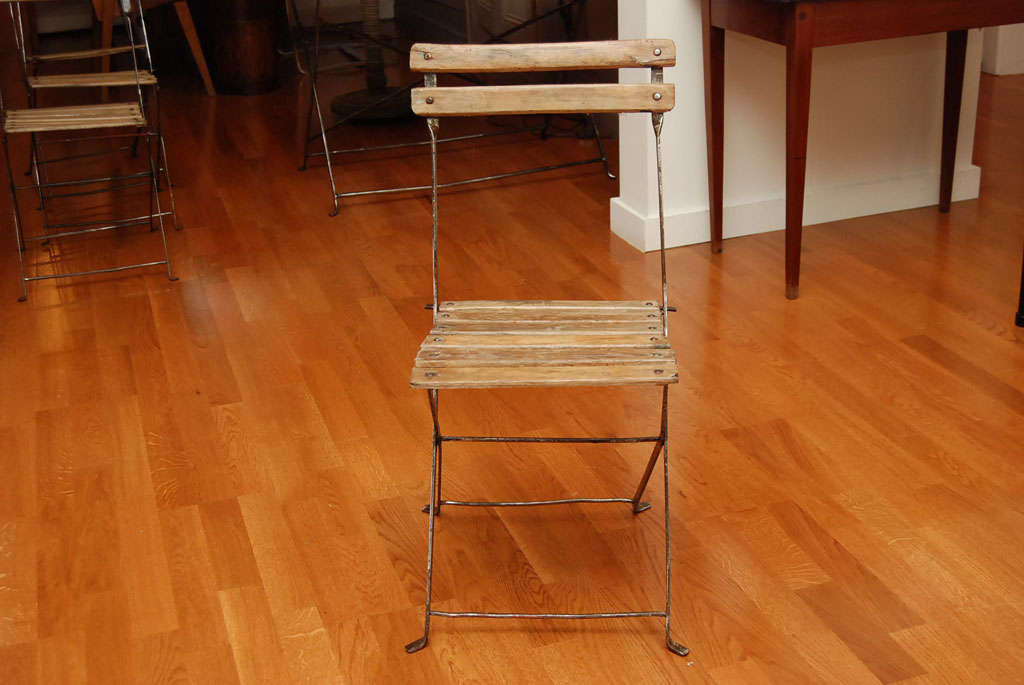 Rustic, charming iron and brass folding bistro chair
A quantity of four are available.
sold 