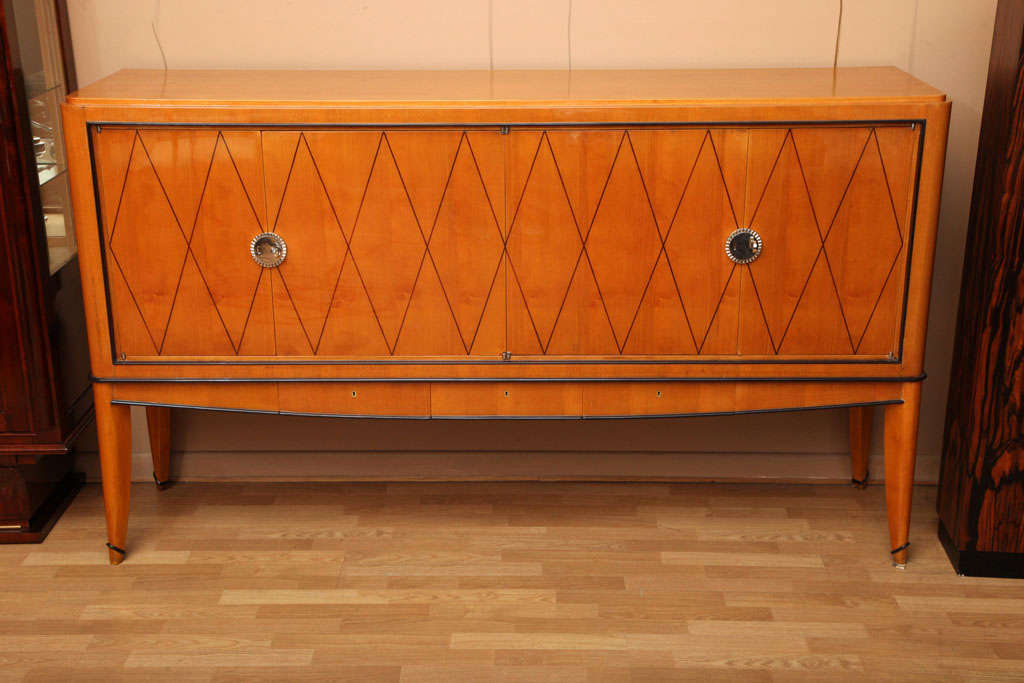 Superb Art Deco sideboard attributed to Andre Arbus. Satinwood cabinet with mahogany inlay and trim. Original polished nickel hardware.