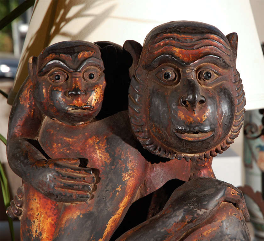 Large, hand-carved, Chinese sculpture of a mother monkey with her baby. Export stamp in wax.