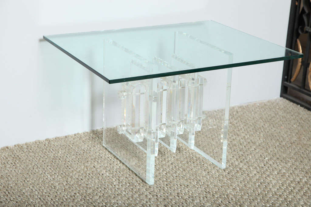 A Lucite And Glass Coffee Table