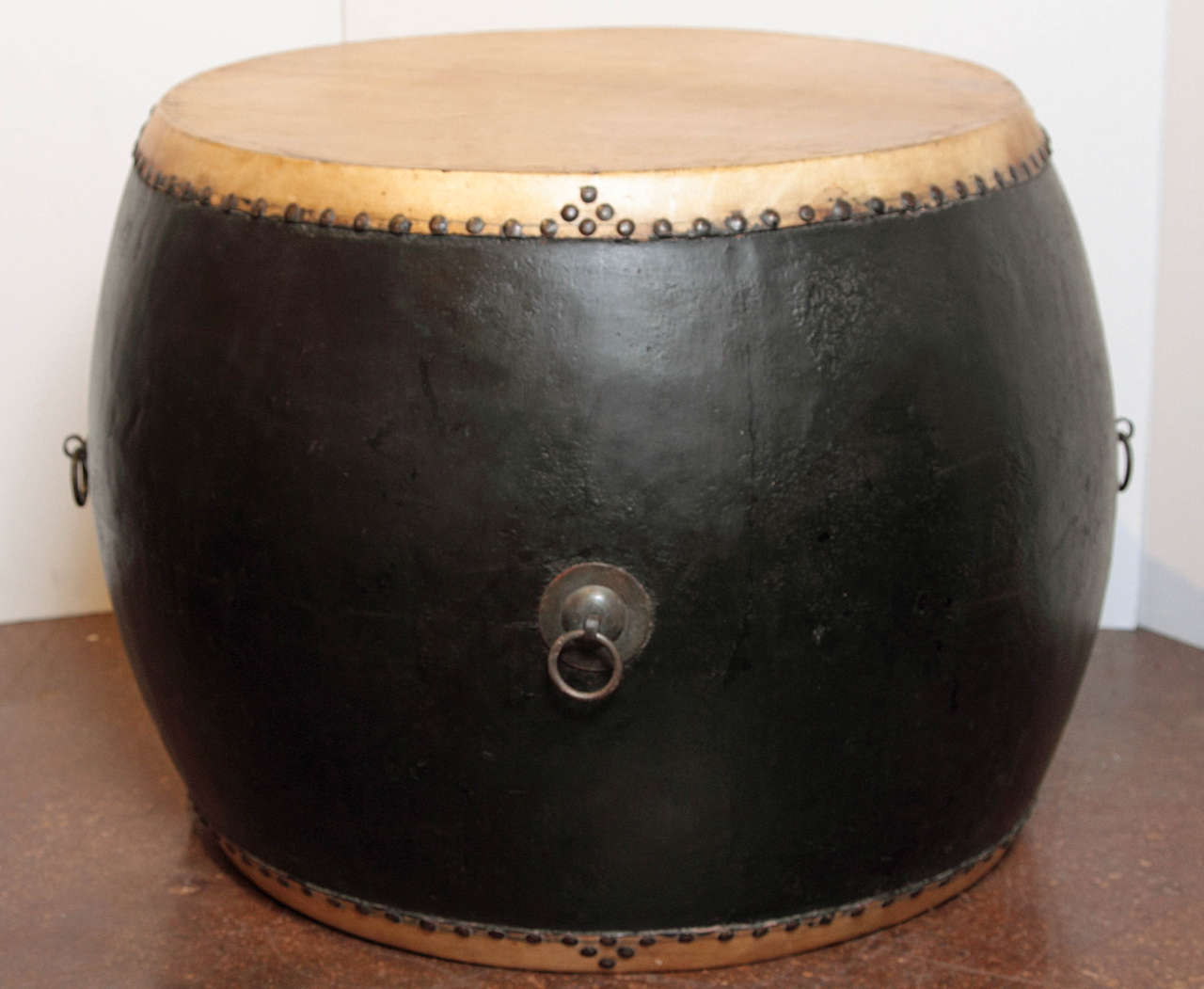 Ceremonial Drum Coffee Table 
20th century Chinese ceremonial drum made of Elm & Leather 
4,000 year old tradition used in festivals and events 
Every detail of nail trims, leather, wood with bronze handles gives an appeal 
can be used as a