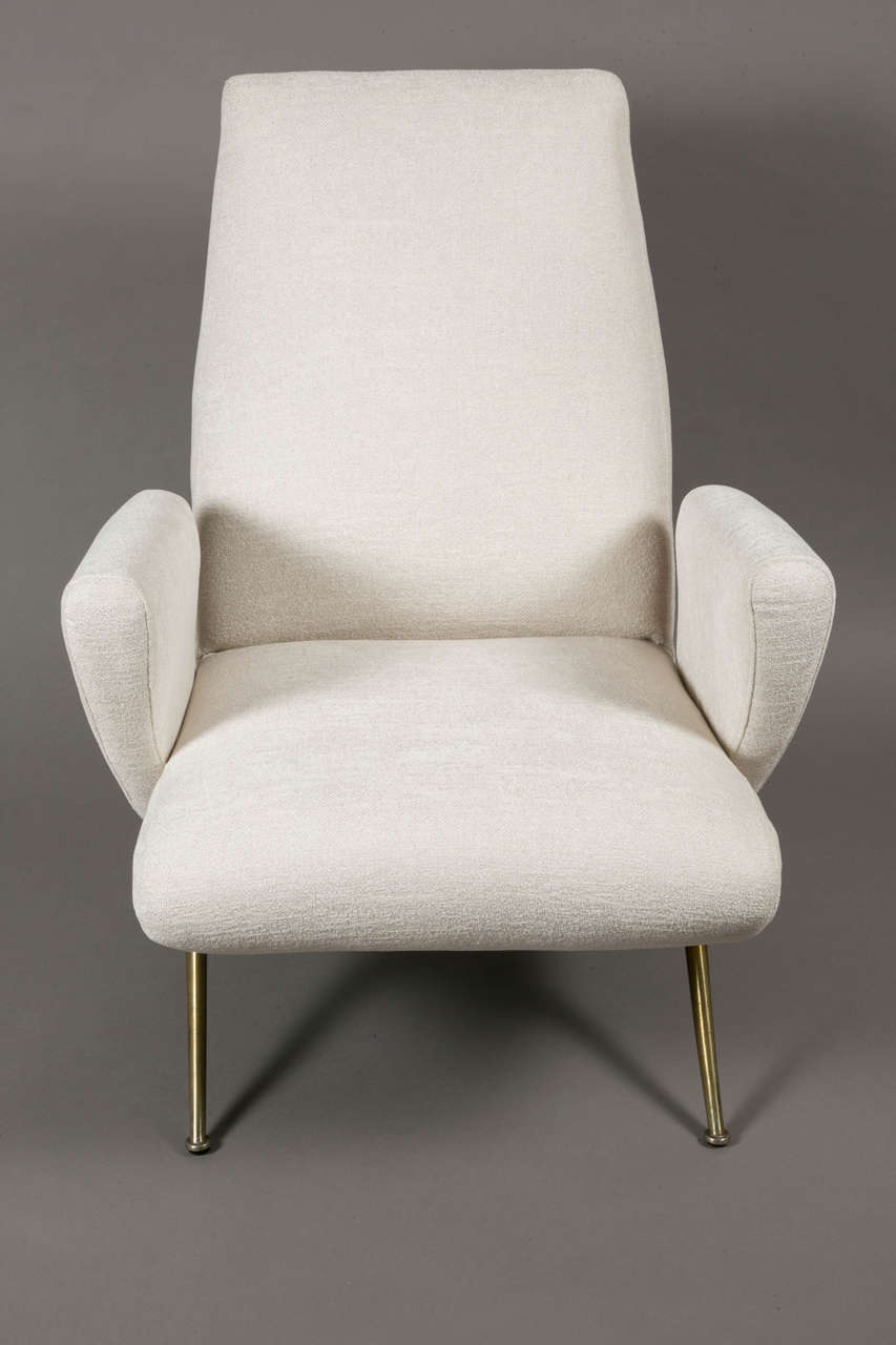 Pair of armchairs, 1950s, by Giovanni (Nino) Zoncada (1898-1988)
Resting on four gilt brass feet.
Arflex prod.   

The Architect and designer Giovanni “Nino” Zoncada is considered one of the 