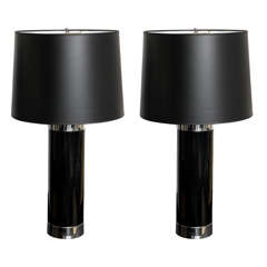 Pair of polished chrome and black patent leather lamps