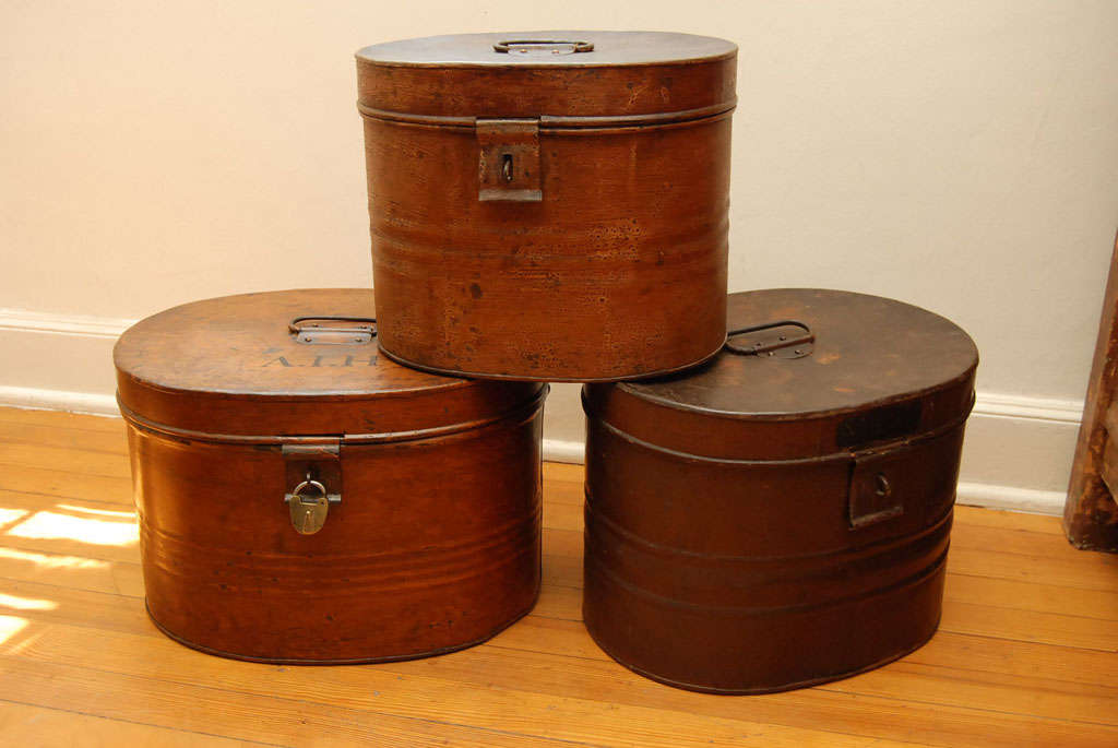 Within these early meal hat tins from England were wonderful hats which were treasured by their owners, each tin is original with old hands and latch. the interiors are very clean. these 3 hat boxes range in price from $275,$300, and $375.
