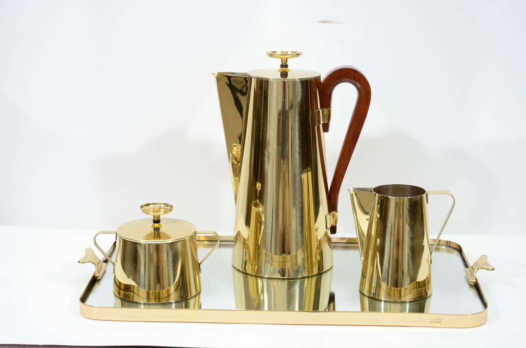 Exceptional 4 piece brass beverage set with a brass and mirror tray.