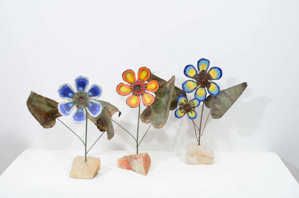 Torch cut enameled bronze flowers on alabaster bases, each signed and dated, C. Jere '68. $550 Each