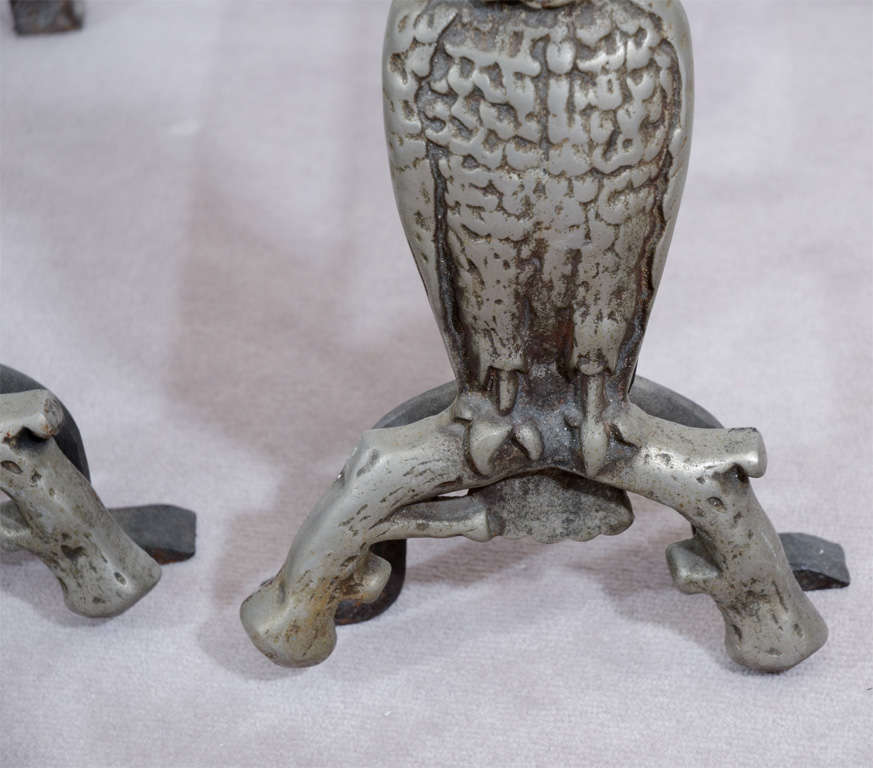 owl andirons with glass eyes