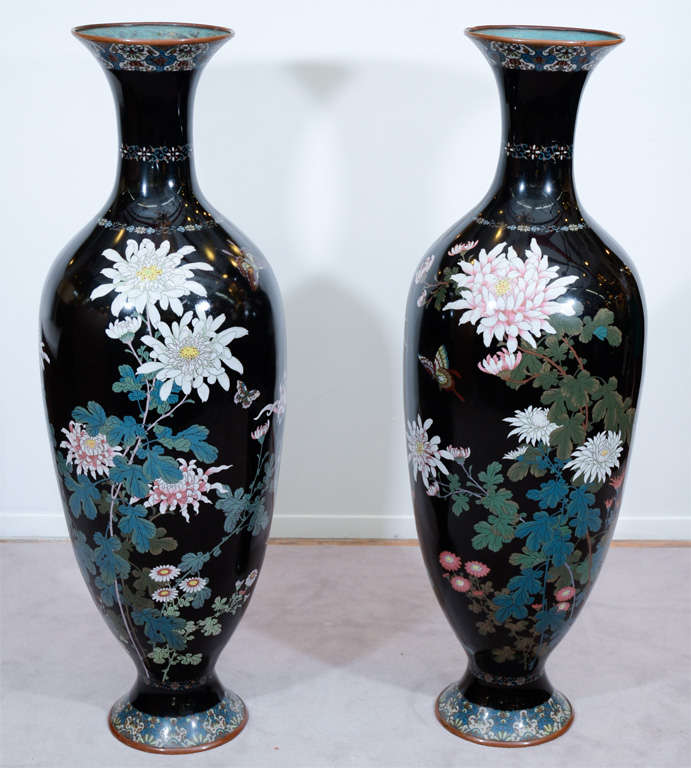 A pair of Japanese Meiji Period Cloisonne Enamel vases. The pieces are formerly of the collection of Mettie C. Jones of California and are reputed to have been purchased at Twentieth Century Fox Studio auctions in 1935, and later MGM Studio