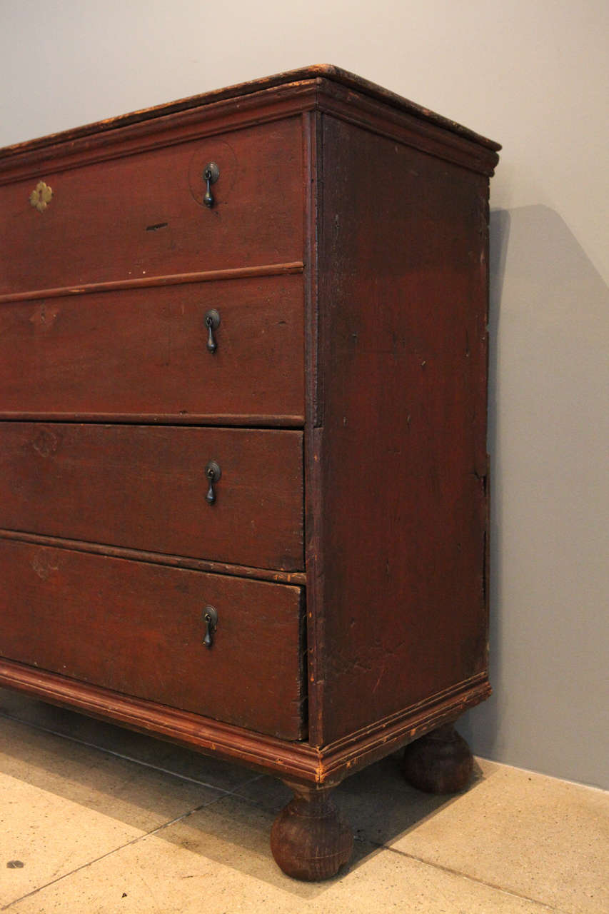 A Tall Chest of Drawers , New England , Late 18th c. 1