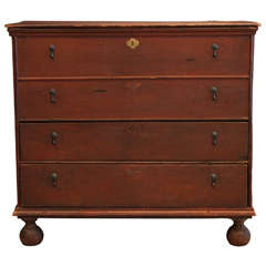 A Tall Chest of Drawers , New England , Late 18th c.