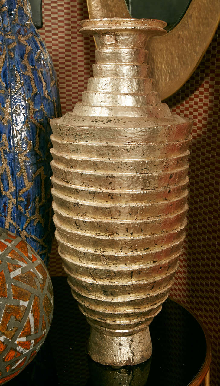 Collection of ceramic vases, dimensions of the blue one : diameter 40 x H 100cm, the gold-white dimensions are diameter 35 x H 80cm, the red one dimension : diameter 40 x H 90cm. All pieces are unique and signed by the artiste Antonio Da Silva.