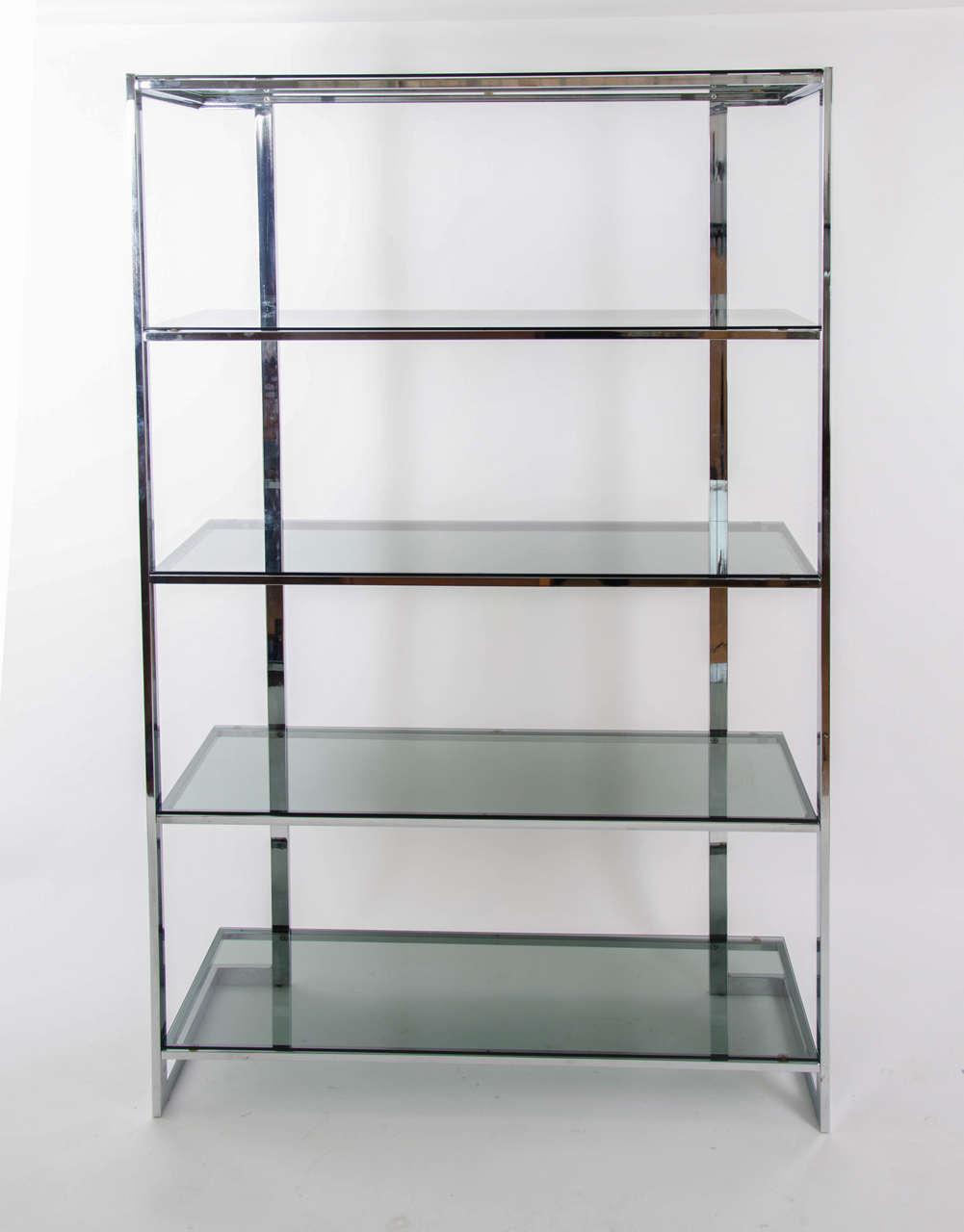 1970's italian steel bookfhelf with five smoked glass shelves.