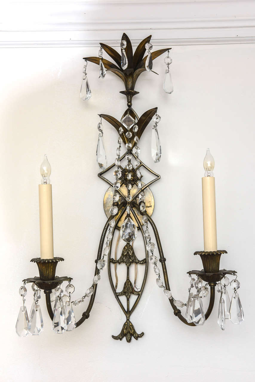Rare set of three French bronze & crystal wall sconces.  Elegant and refined to find such a set.  Restored finish & newly rewired with three custom wax sleeves on each.

Originally $ 3,850.00