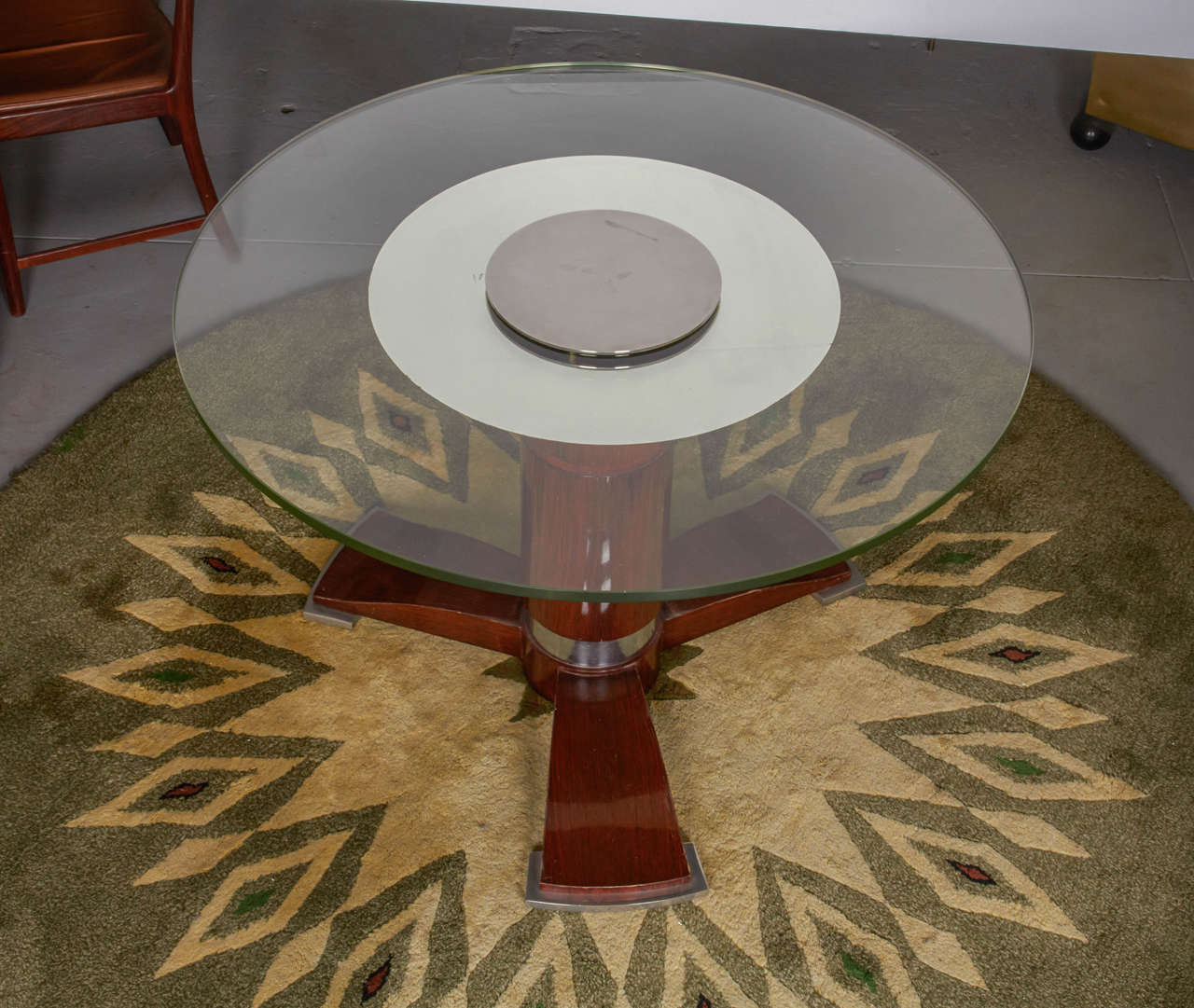 A Jules Leleu rosewood and chromium-plated metal and glass low table.
Literature:
Viviane Jutheau, Jules and Andre Leleu, 1989, page 75 for a similar example done by Leleu for the ocean liner Normandy.