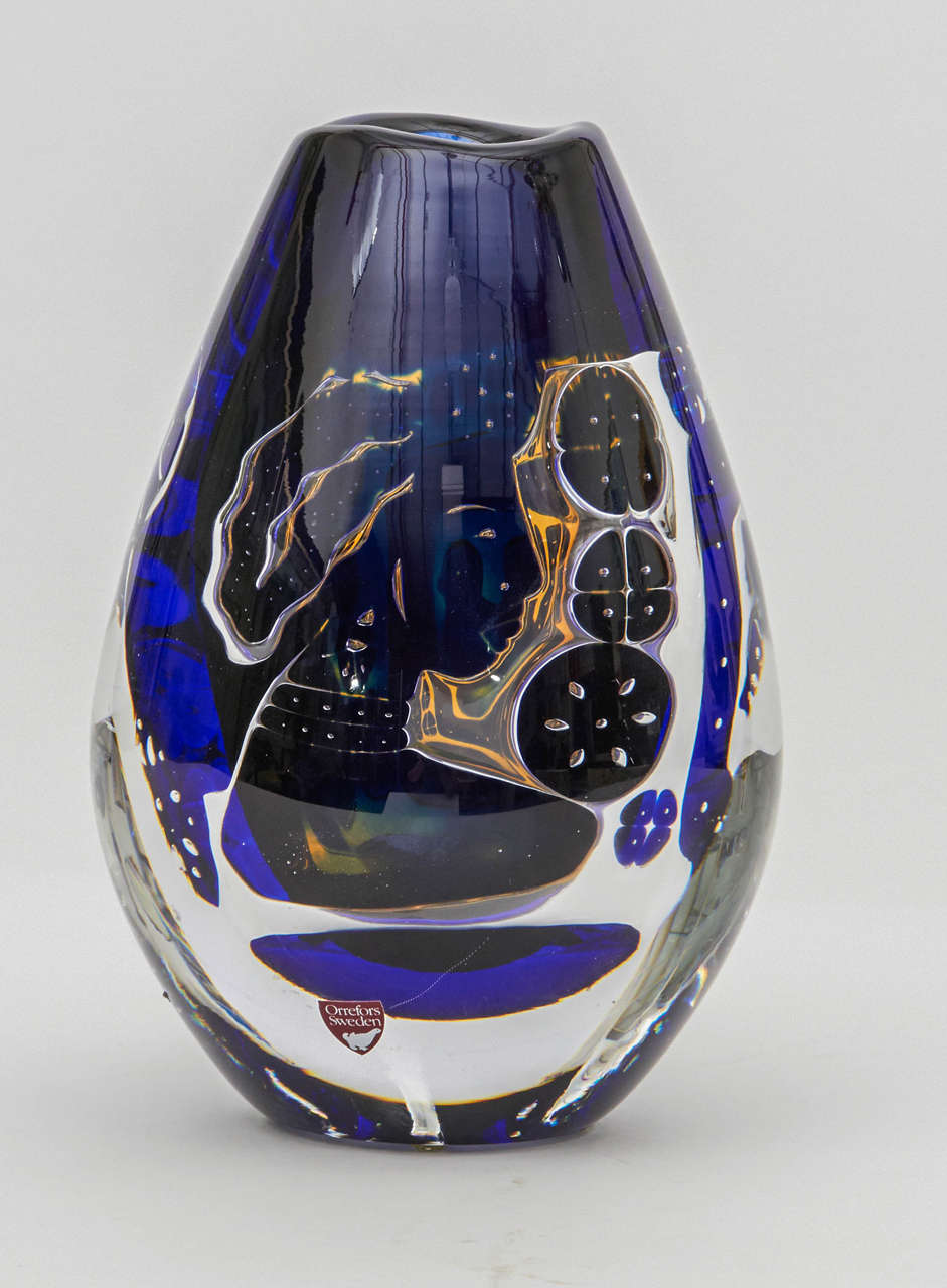 Ariel girl and dove vase by Edvin Öhrström for Orrefors
of blue, silver and clear glass.
Signed and dated.