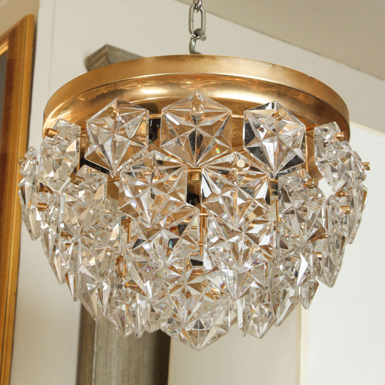 Glamorous Kinkeldey flush mount chandelier in a polished gold / brass finish with faceted crystal elements.