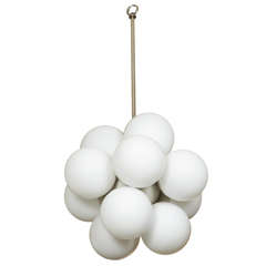 Stylish chandelier with white satin glass globes