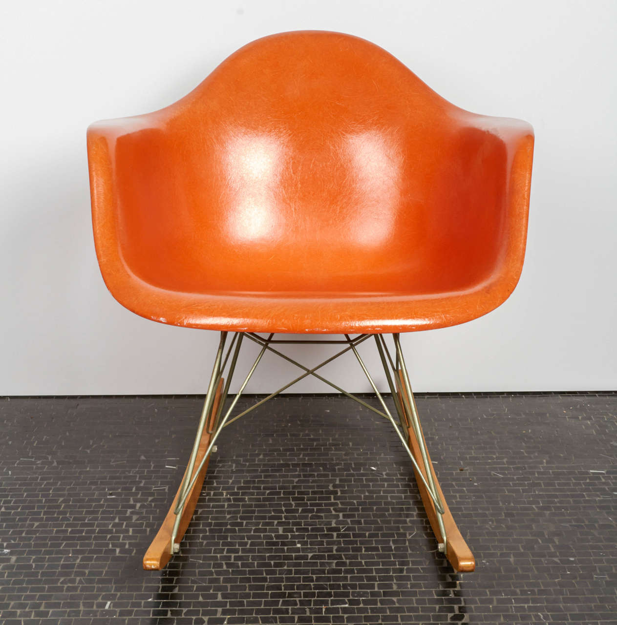 Charles and Ray Eames orange fiberglass rocker, mfg. Herman Miller, 1959.  Purchased from original owner.