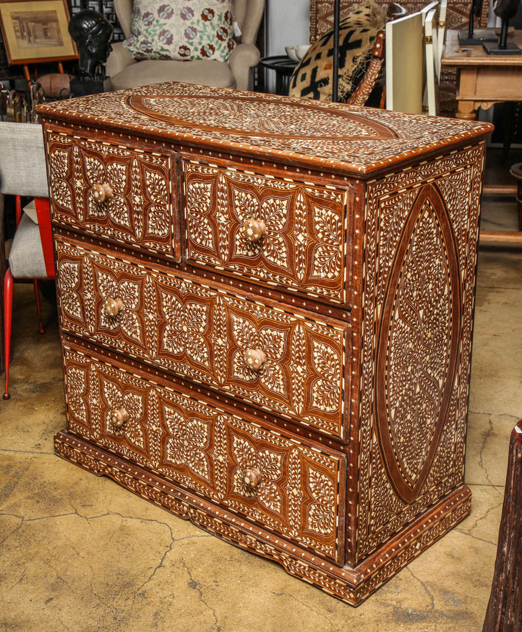 A bone inlaid chest of drawers from India. Four drawers. Inlays in a Classic Indian pattern.