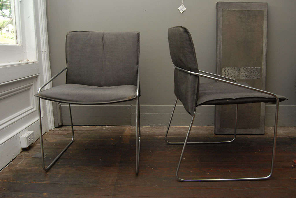 Very comfortable, simple and sleek midcentury modern chairs.
Search terms:  lounge chairs, 