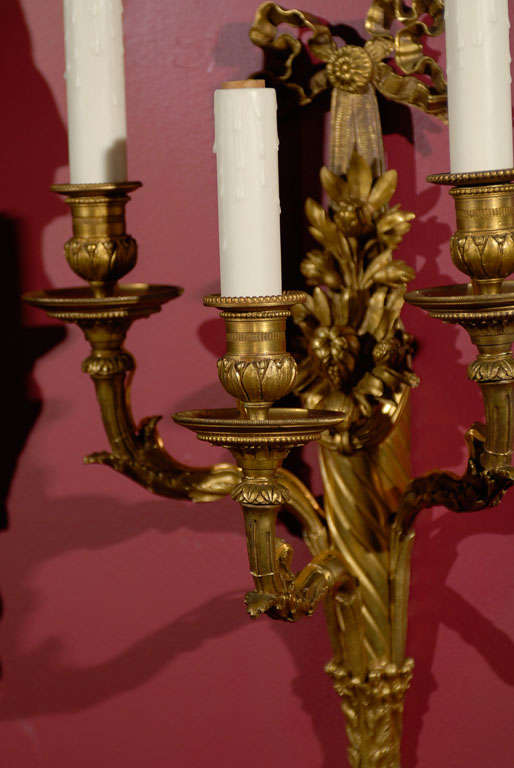 French Pair of gilt bronze sconces