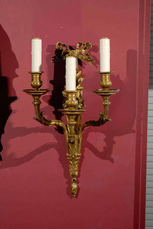 Fine pair of three light gilt bronze sconces from France now electrified