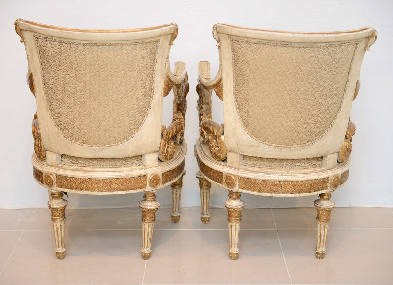 Giltwood An Exceptional Pair of Italian Neoclassic Painted and Parcel Gilt Armchairs