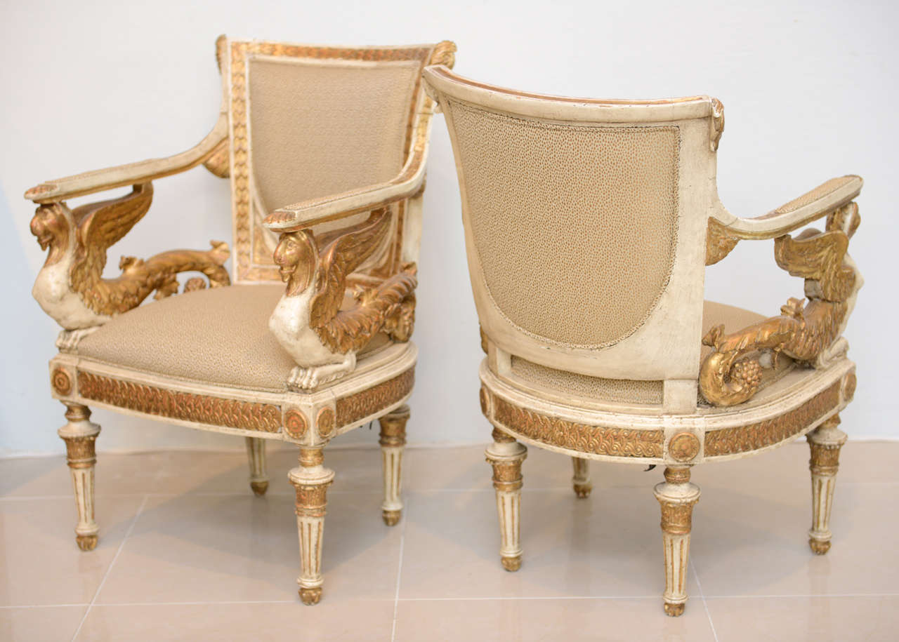 An Exceptional Pair of Italian Neoclassic Painted and Parcel Gilt Armchairs 1