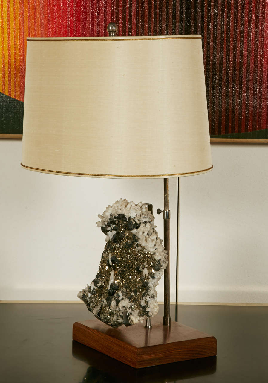 Pyrite table lamp with polished brass structure and rectangular wood base.
Ecru silk shade.
Dimensions : H. 60-63 x L. 26 x P. 19 cm (H. 24.80 x W. 10.23 x D. 7.48 in.)
With shade : H. 60-63. X L. 39 x P. 26,5 cm (H. 24.80 x W. 15.35 x D.10.43