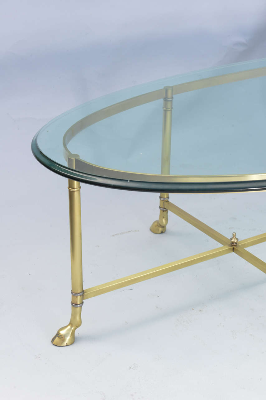 Polished Brass Cocktail Table with Oval Glass Top In Excellent Condition In West Palm Beach, FL