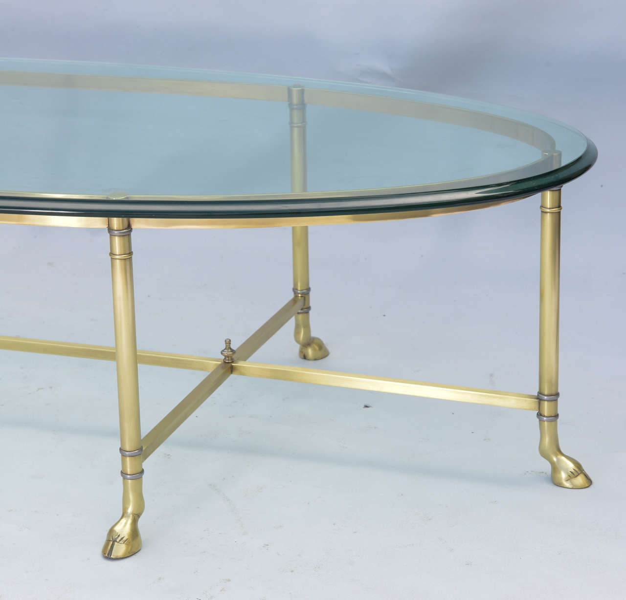 Mid-20th Century Polished Brass Cocktail Table with Oval Glass Top
