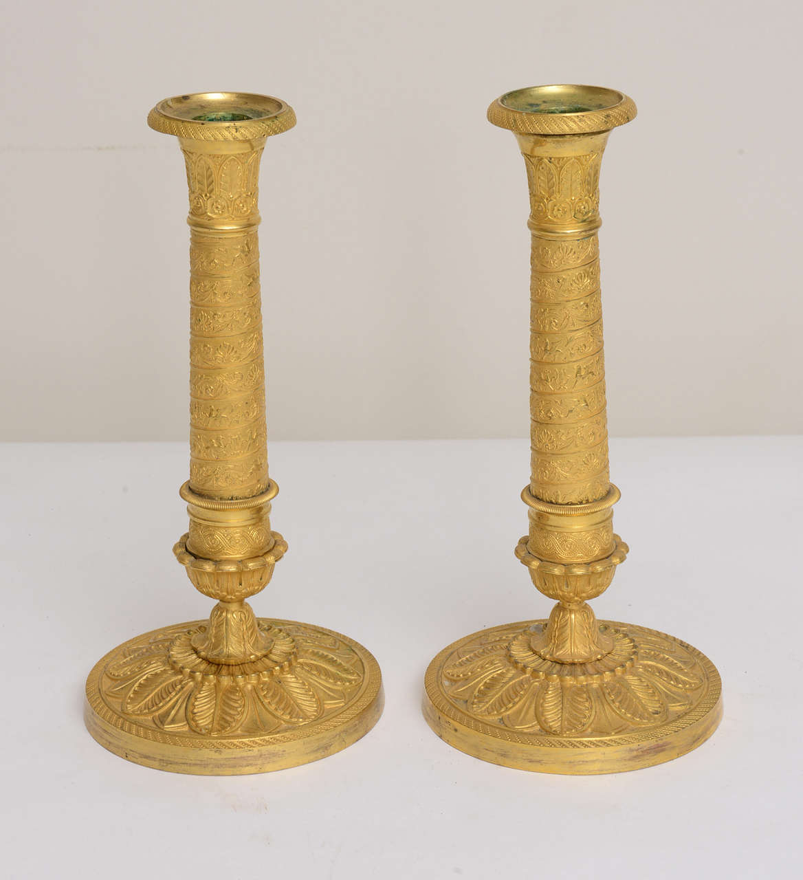 Pair of  French Empire Gilt Bronze and Bronze Dore Candlesticks, 1800s In Good Condition For Sale In West Palm Beach, FL
