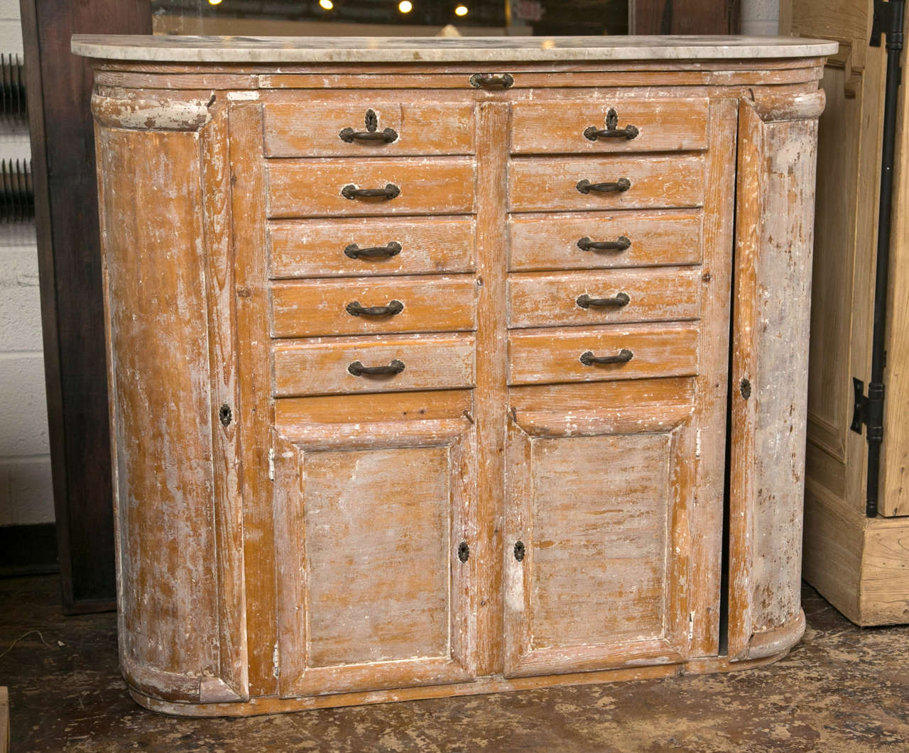 Marble-top cabinet with multi-drawers and multi-doors and slider worn paint finish over oak.