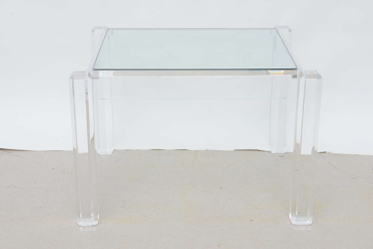 Vintage lucite end table with geometric clean profile.