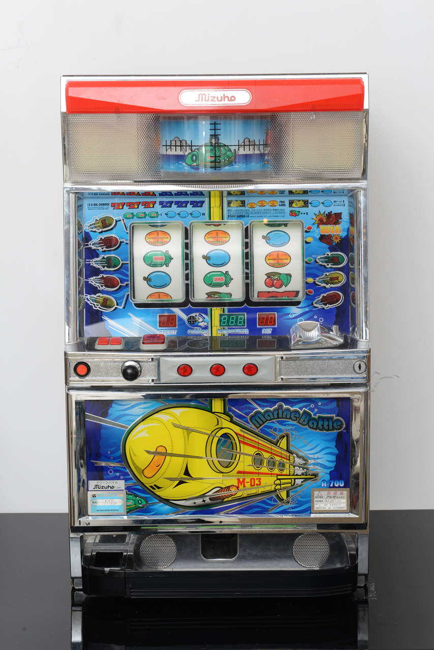 Whimsical vintage Japanese slot machine with wonderful graphics and sound effects. The machine is working and is sold with original key to enter body and retrieve original coins.  Feel free to request a video of the machine in action to hear the