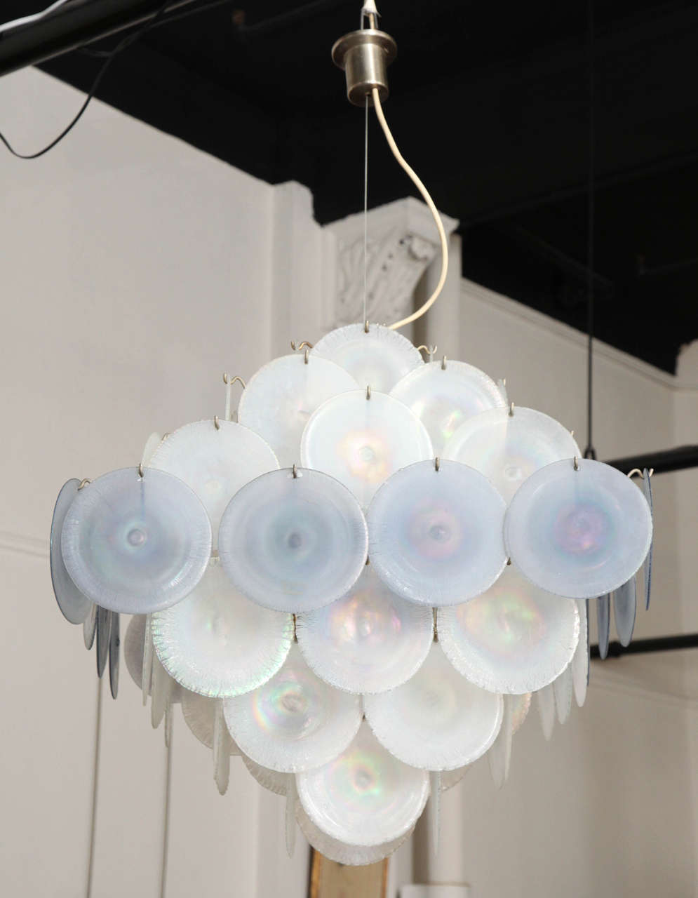 Fabulous large chandelier made in Venice 1969 by Mazzega designed by carol Nason. 64 blown glass disks in a iridescent pearl with a pail gray blue stretch glass technic, all original from 1960s, great quality glass. On the diagonal it's 30”.