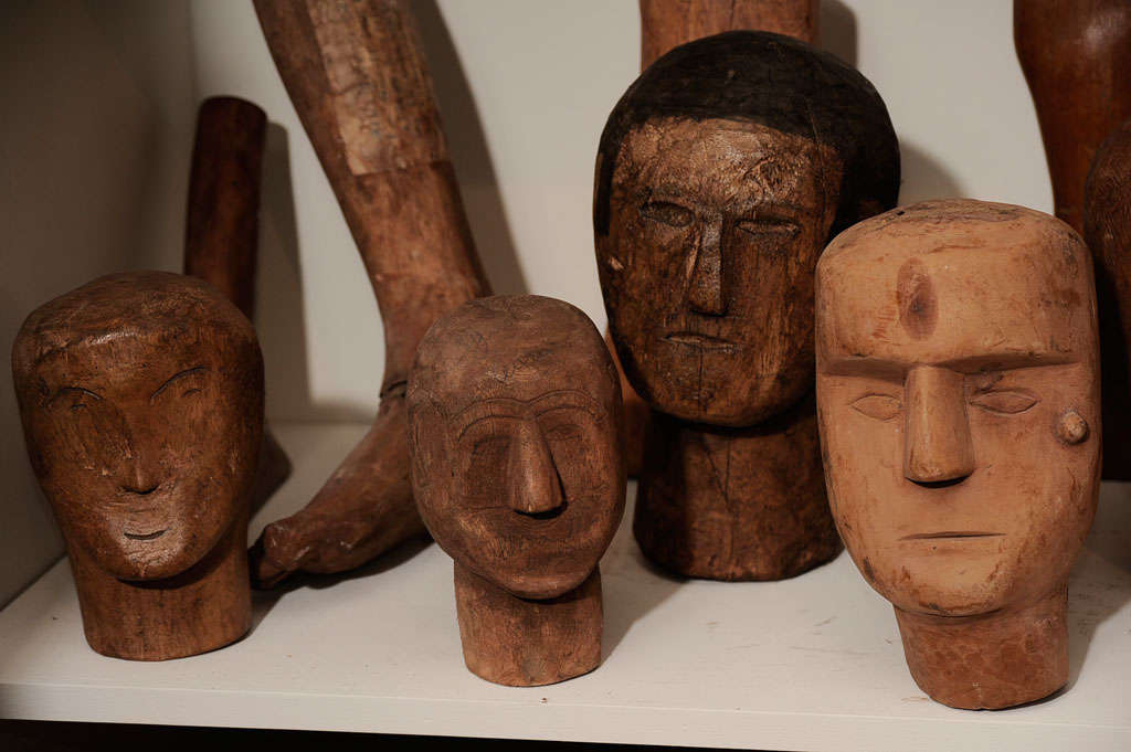 Assorted ex-voto heads from Brazil, used as carved votive offerings after sickness and malady. Priced as individual pieces, prices and measurements range according to piece, please inquire for further details.