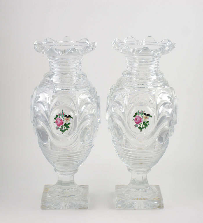 A rare pair of Baccarat cut crystal vases, both with medallions containing enameled gold roses and pansies