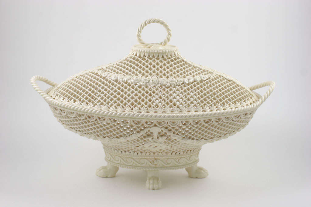 A rare Wedgwood Imperial Queensware covered pierced basket on four paw feet, upper case mark