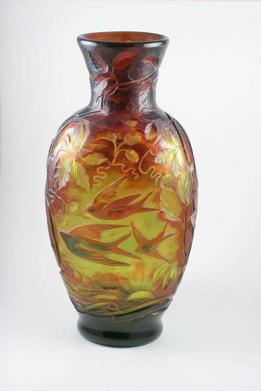 An important Stevens & Williams cameo and intaglio carved vase with birds and the sun on one side and the moon and bats on the other, ex: Honeybourne Museum