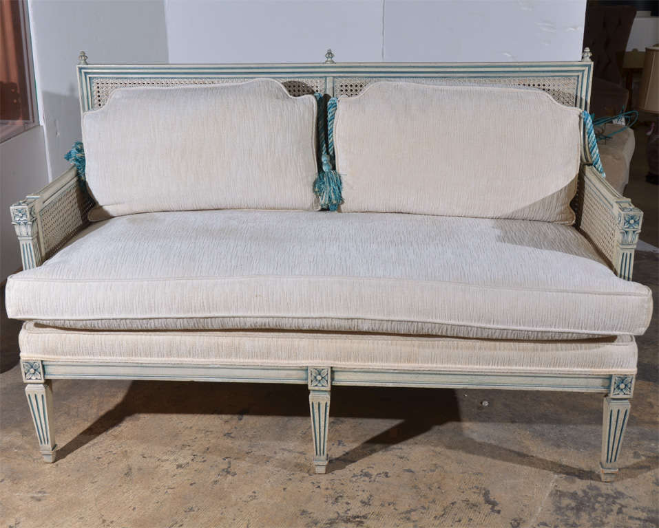 1960's Italian double settee with original fabric and paint. Hand double sided caning. Settee foundation stuffed with original horse and hog hair.