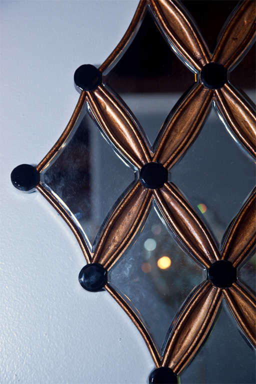 large diamond shaped mirror