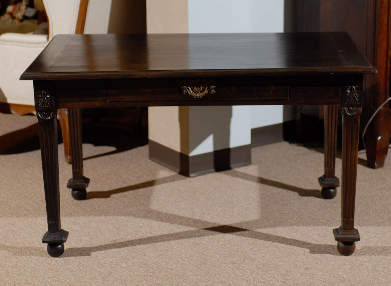 19th century black painted Empire style desk, circa 1890.
The good clean lines of the Empire style blend well with current design trends. This desk can work well with other antiques or add warmth to a room of modern pieces. The proportions provide