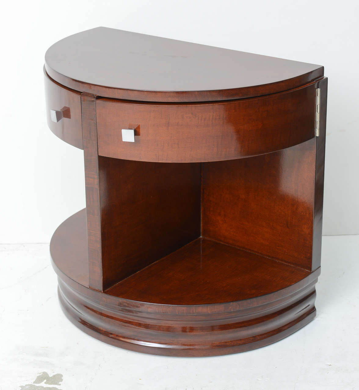 Pair of mahogany demilune side tables or nightstands. Design attributed to Donald Desky for Widdicomb.

Please feel free to contact us directly for any additional information or a shipping quote by clicking 