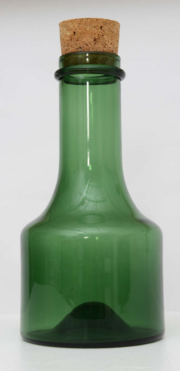 Green blown art glass carafe with cork top. Inscribed signature along bottom rim of carafe.
Specially priced for todays Sale!