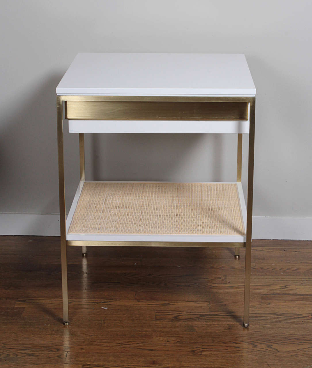 re: 392 Bedside Tables in Soft Chamois gloss on satin brass frames. In Excellent Condition For Sale In New York, NY