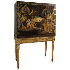 Early 19th c English chinoisserie black lacquered cabinet on stand