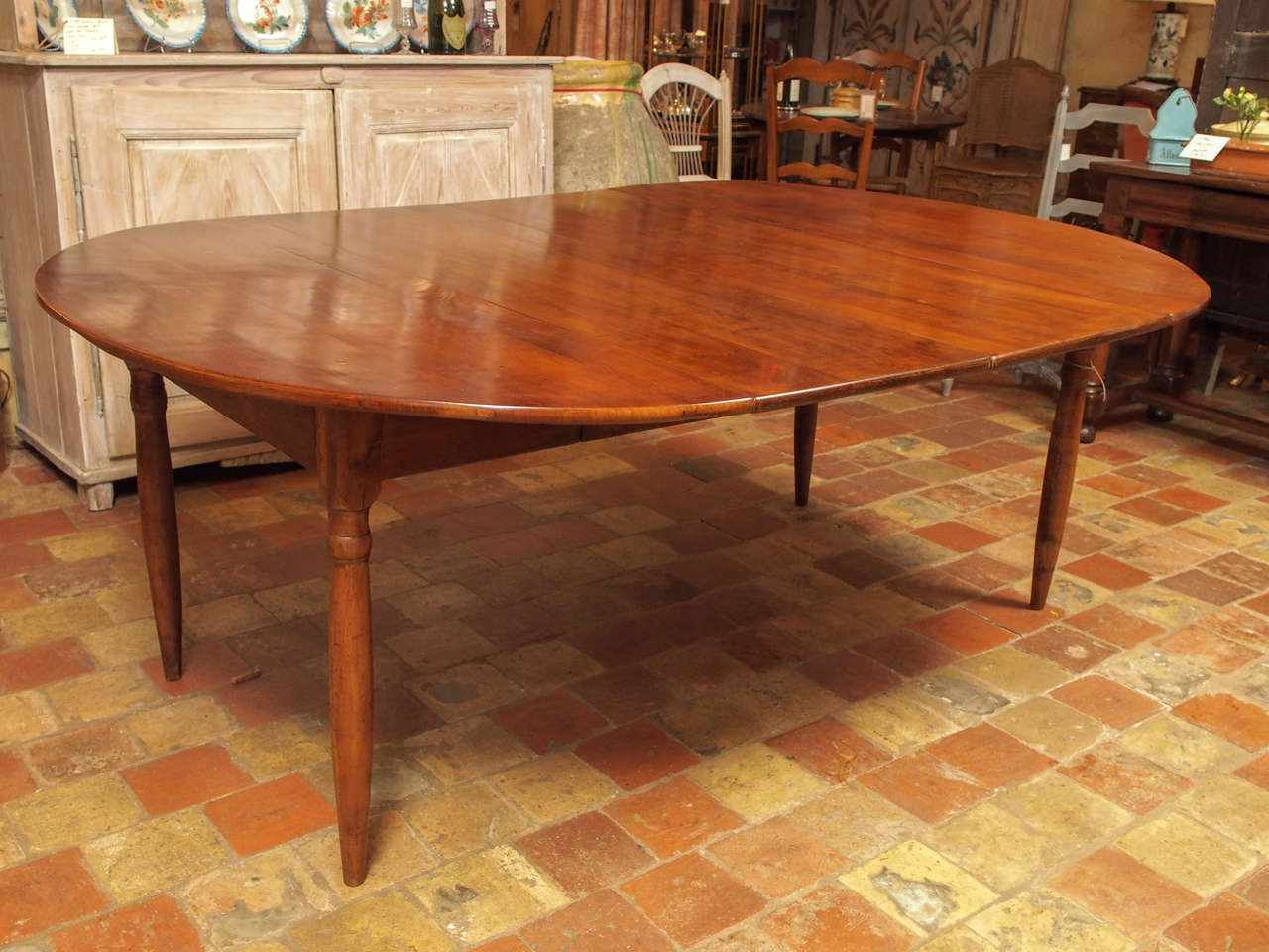 19th c. French Oval Dining Table with Two Leaves.