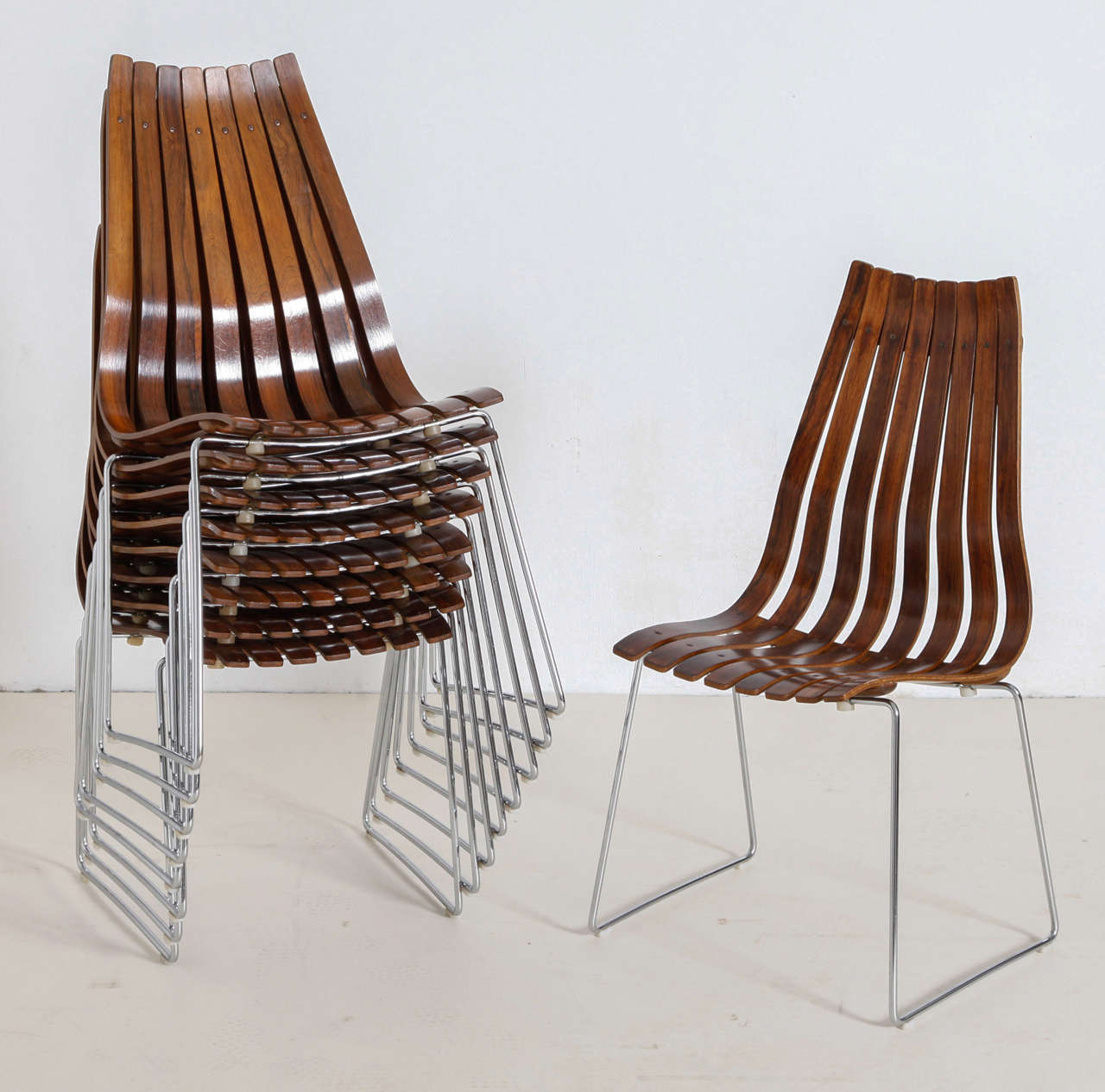 10 chairs designed by hans Brattrud, Norway 1970's made by Hove, Oslo.
Chairs in Rosewood