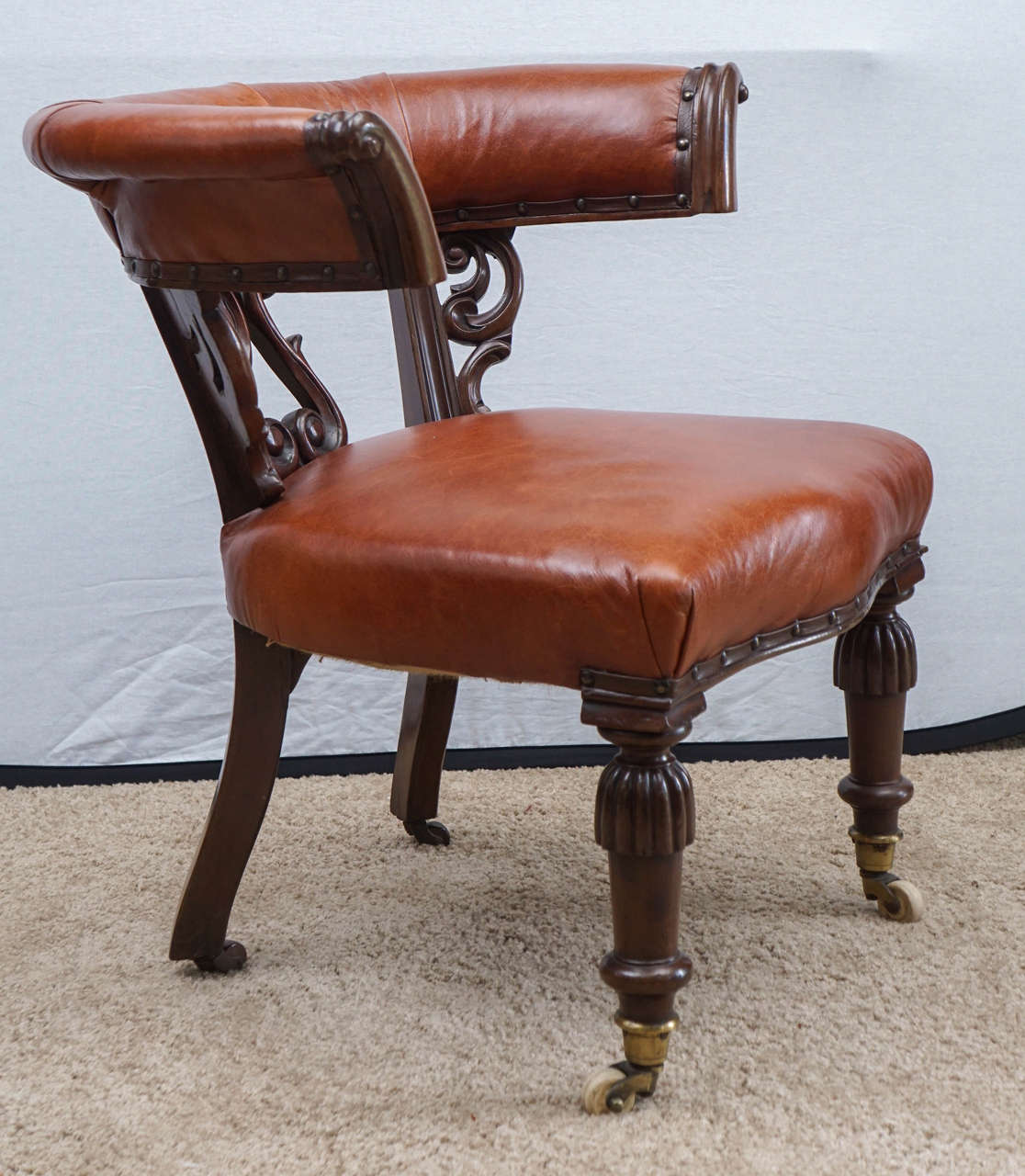 Early Victorian Mid-19th Century English Leather Chair on Casters For Sale